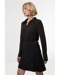 Karen Millen - Tailored Buckle Detail Pleated Mini Skirt - Lyst