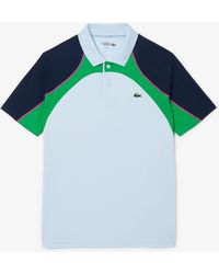 Lacoste - Ultra Dry Colour Block Tennis Poloshirt In Blauw - Lyst