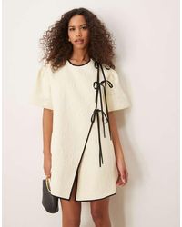 Ghospell - Asymmetric Contrast Bow Mini Dress - Lyst