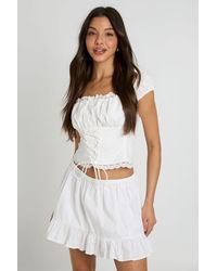 Boohoo - Broderie Trim Tie Front Corset Top - Lyst