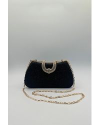 SVNX - Shimmer Clutch Bag - Lyst