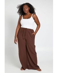 Boohoo - Plus Elasticated Tie Front Wide Leg Beach Trouser - Lyst