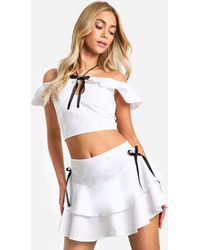 Boohoo - Cotton Poplin Contrast Bow Halterneck Top - Lyst