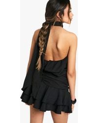 Boohoo - Textured Ruched Frill Skirt Halterneck Mini Dress - Lyst