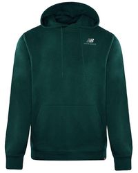 New Balance - Long Pullover Essentials Embroidered Hoodie Mt11550 Tkk Cotton - Lyst