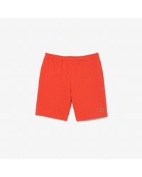 Lacoste - Regular Fit Fleece Korte Broek In Oranje - Lyst