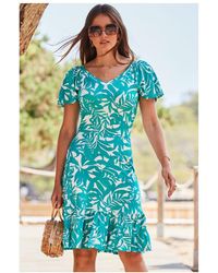 Sosandar - Green Floral Print Ruffle Hem Fit & Flare Jersey Dress - Lyst
