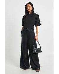 Boohoo - Petite Satin Lace Trim Wide Leg Trousers - Lyst