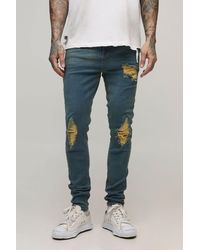 BoohooMAN - Tall Skinny Fit Rip & Repair Embroidery Denim Jeans - Lyst