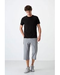 TOMMY LIFE - Capri Cycling Shorts - Lyst