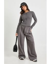Boohoo - Petite Rib Button Through Long Sleeve Tracksuit - Lyst