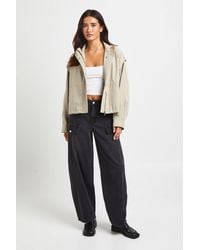 Boohoo - Mid Waist Cargo Utility Barrel Jean - Lyst