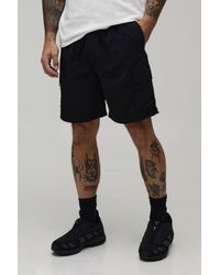 BoohooMAN - Relaxed Fit Elasticated Nylon Cargo Shorts - Lyst