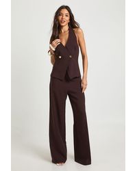 Boohoo - Button Wrap Front Jumpsuit - Lyst