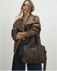 River Island - Leopard Jacquard Canvas Holdall Bag - Lyst