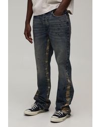BoohooMAN - Washed Camo Gusset Stacked Flared Jeans - Lyst