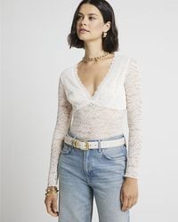 River Island - Bodysuit Plunge Lace Long Sleeve Nylon - Lyst