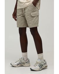 BoohooMAN - Slim Fit Elasticated Mid Length Twill Cargo Shorts - Lyst