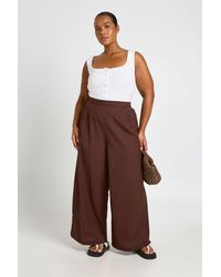 Boohoo - Plus Linen Look Pleated Wide Leg Trouser - Lyst
