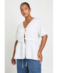 Boohoo - Plus Ruched Tie Front Detail Short Sleeve Smock Top - Lyst