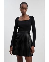 Karen Millen - Viscose Rib Pu Mix Tab Detail Pleated Knit Mini Dress - Lyst