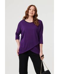 Izabel London - Asymmetric Zip Hem 3/4 Sleeve Tunic Top - Lyst