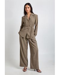Boohoo - Peached Pleat Front Wide Leg Trouser - Lyst