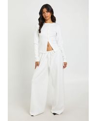 Boohoo - Soft Touch Button Through Long Sleeve Top And Straight Leg Jogger Set - Lyst