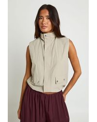 Boohoo - Funnel Neck Sleeveless Zip Through Top - Lyst