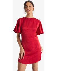 Boohoo - Tie Back Angel Sleeve Mini Dress - Lyst