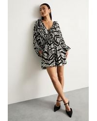 Warehouse - Petite Viscose Zebra Jacquard Skater Dress - Lyst
