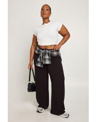 Boohoo - Plus Basic Fold Over Waistband Flared Legging - Lyst