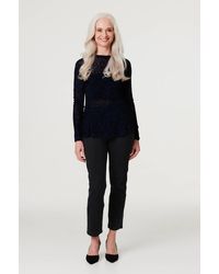 Izabel London - Sheer Lace Long Sleeve Peplum Top - Lyst
