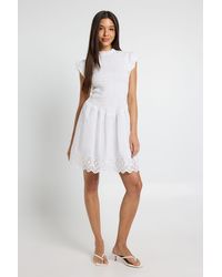 Boohoo - Shirred Body Mini Dress With Broderie Hem - Lyst