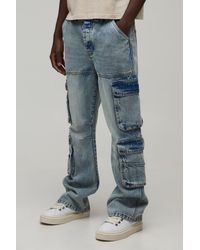 BoohooMAN - Washed Relaxed Fit Cargo Flared Jeans - Lyst