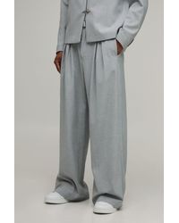 BoohooMAN - Tailored Double Pleat Belted Wide Fit Suit Trousers - Lyst