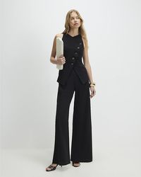 River Island - Jumpsuit Collarless Asymmetric Sleeveless - Lyst