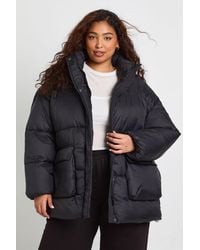 Boohoo - Plus Funnel Neck Textured Puffer Jacket - Lyst