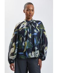 Karen Millen - Plus Size Viscose Floral Print Woven Tie Neck Blouse - Lyst