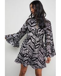 Warehouse - Flippy Hem Volume Sleeve Viscose Zebra Jacquard Dress - Lyst