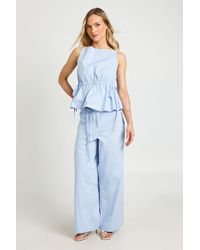 Boohoo - Petite Low Rise Tie Detail Straight Leg Trouser - Lyst