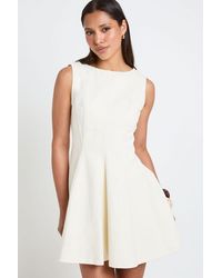 Boohoo - Sleeveless Flippy Hem Denim Dress - Lyst