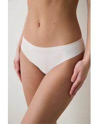 Penti - Invisible Laser Cut Lace Slip Briefs - Lyst