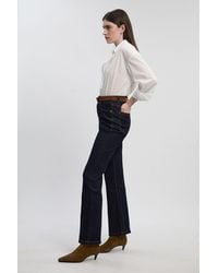 Karen Millen - Petite Stretch Denim Pintuck Flare Jean - Lyst