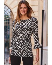 Sosandar - Spot Print Twist Front Fluted Sleeve Top - Lyst