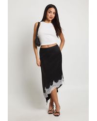 Boohoo - Lace Asymmetric Hem Satin Midi Skirt - Lyst