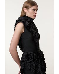 Karen Millen - Figure Form Bandage Knit Woven Rosette Detail Top - Lyst