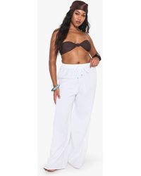 Boohoo - Plus Linen Beaded Low Rise Beach Pants - Lyst