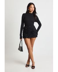 Boohoo - Petite Crepe Rose Mini Skirt - Lyst