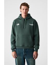 Grimelange - Logo Printed Hooded Sweatshirt - Lyst